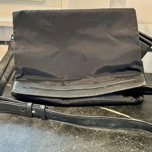 Black Tumi messenger bag